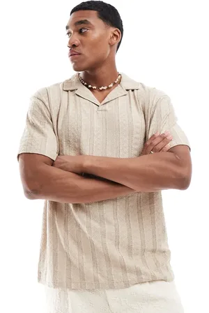 ASOS Relaxed polo with revere collar in beige textured stripe