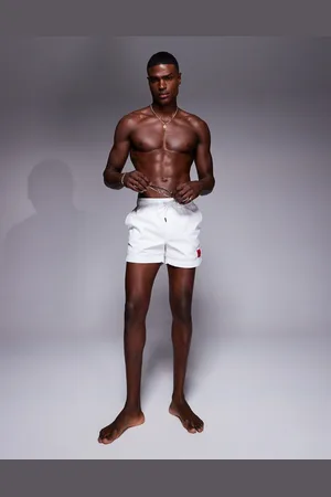 HUGO BOSS Dominica label logo swim shorts in