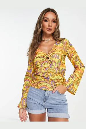 VILA Ring detail top with flared sleeves in 60s retro print