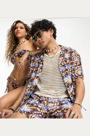 Reclaimed Unisex beach revere shirt in 90s celestial print