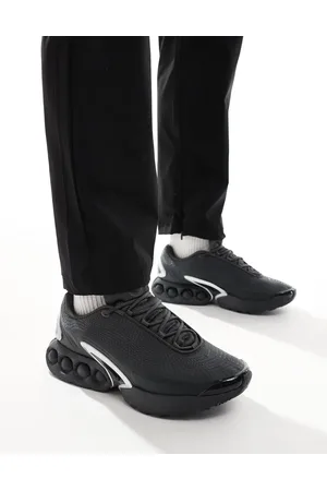 Nike Air Max DN trainers in and metallic silver