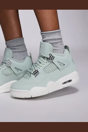 Jordan Nike Air 4 Retro trainers in and silver