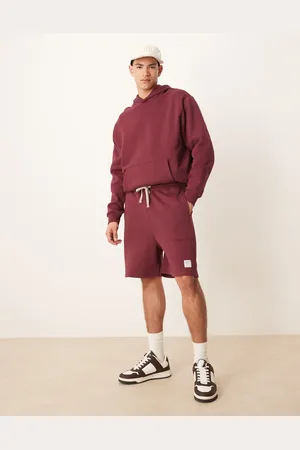 ASOS Co-ord oversized shorts with woven badge in burgundy