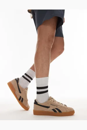 Reebok Club C Grounds trainers in tan and black