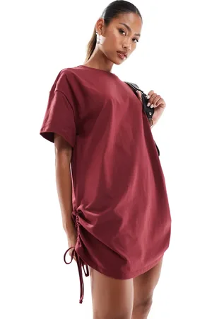 In The Style Exclusive ruched side oversized mini t-shirt dress in burgundy
