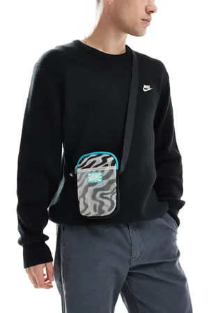 Nike Heritage flight bag in and black print