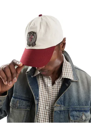 ASOS Vintage casual baseball cap in ecru with contrast burgundy peak and crest detail