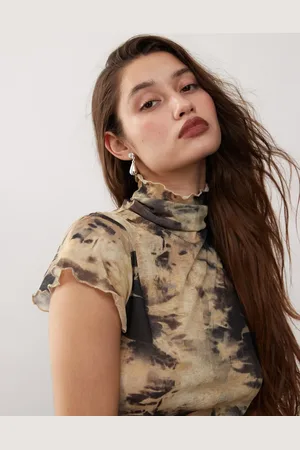 Reclaimed High neck capped sleeve top in gothic blur print