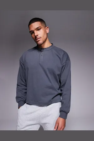 ASOS Heavyweight oversized boxy long sleeve henley t-shirt with step hem in charcoal