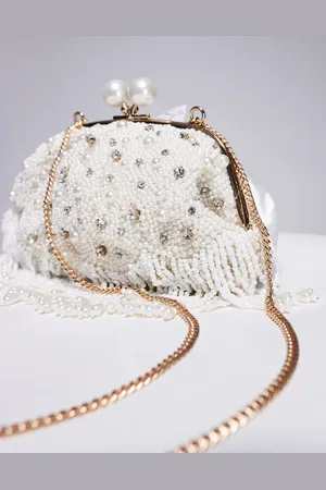 True Decadence Pearl and bead soft clutch bag in