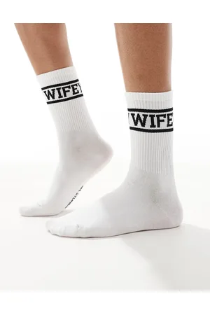 Six Stories Wifey socks in white and black