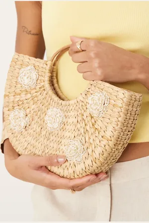 Glamorous Straw top handle bag with flower embellishment in natural