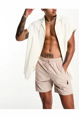ASOS Swim shorts in short length in beige