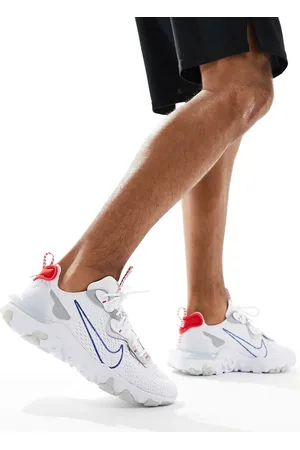 Nike React Vision trainers in white and blue