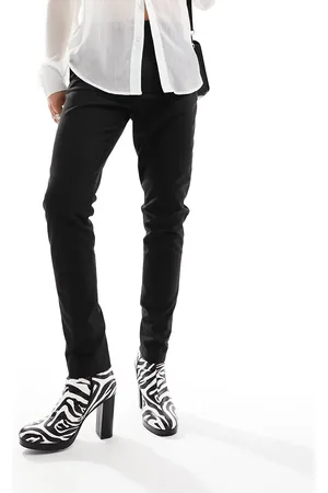 ASOS Heeled boots in zebra print faux leather
