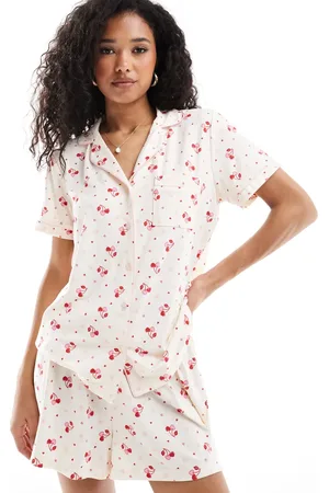 Loungeable Super soft jersey revere top and short pyjama set with piping detail in cherry and heart print