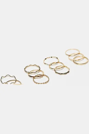 ASOS Pack of 12 rings with twist details and engraved designs in tone