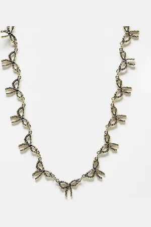 Reclaimed Bow necklace in burnished gold