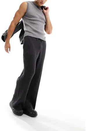 Weekday Darwin loose fit knitted trousers in dark melange
