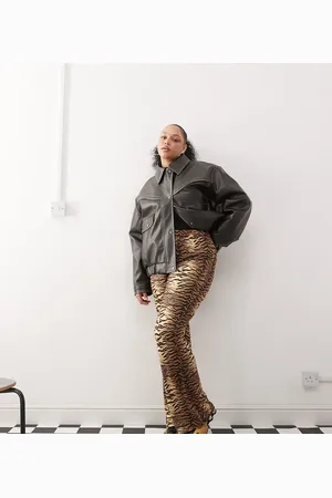 Noisy May Tiger print flare trousers in