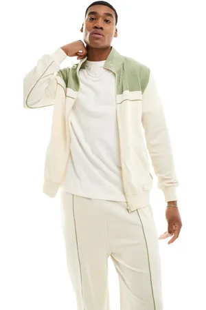 ASOS Standard fit ribbed velour jacket in off with green detail