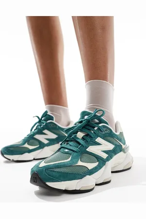 New Balance 9060 trainers in dark and white
