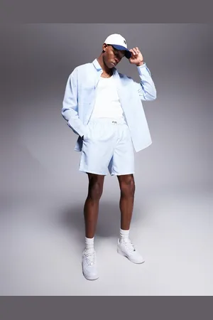 ASOS Co-ord swim shorts in mid length in white and stripe with badge detail