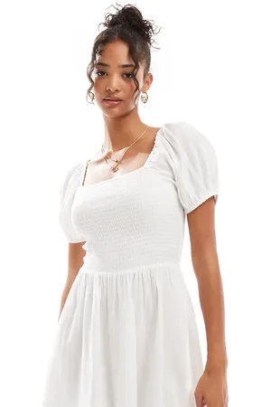 Esmée Esmee mini puff sleeve beach dress in