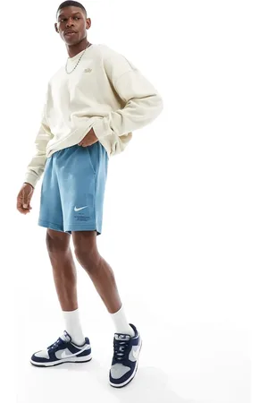 Nike Swoosh graphic shorts in