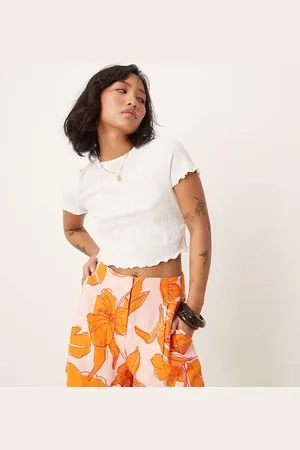 ASOS ASOS DESIGN Petite high waist seam detail tailored shorts with linen in palm print