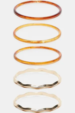 ASOS Pack of 5 bangle bracelets with tort and metal mix detail in