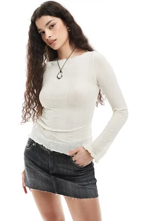 Monki Long sleeve boatneck ribbed structure jersey top with lettuce hemlines and cuff slits in off
