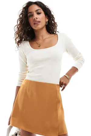 ASOS ASOS DESIGN Petite wrap satin skirt in gold