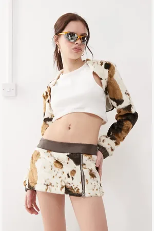 The Kript Cow print low rise micro mini skirt with front zip co-ord