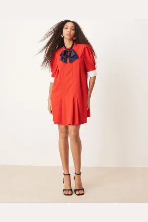 Sister Jane Contrast bow pleated mini dress in