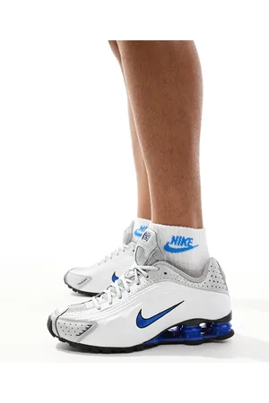 Nike Shox R4 trainers in and metallic silver