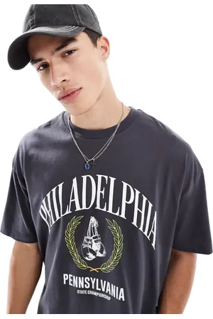 ASOS Boxy oversized t-shirt with sports graphic in charcoal