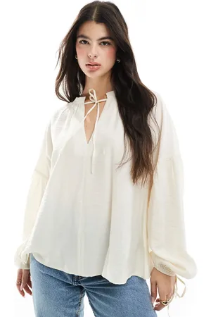 ASOS Tie neck top with volume sleeve in stone