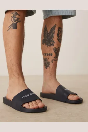 Calvin Klein Logo sliders in