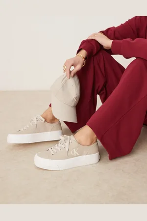 Calvin Klein Vulc flatform canvas trainers in beige