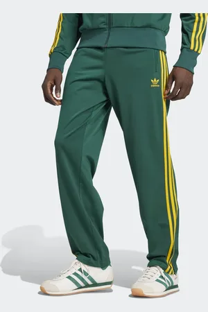 adidas Firebird track pants in and yellow