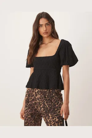 Gina Tricot Wavy textured jersey with puff sleeves and peplum hem in