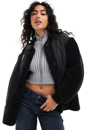 ASOS Borg spliced puffer jacket in black