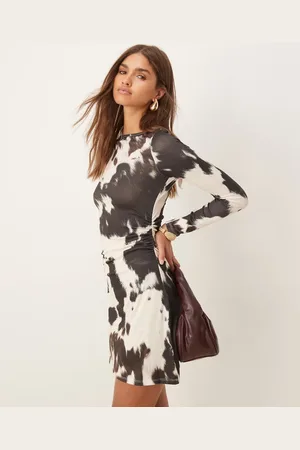 ASOS Long sleeve mini dress in cow print