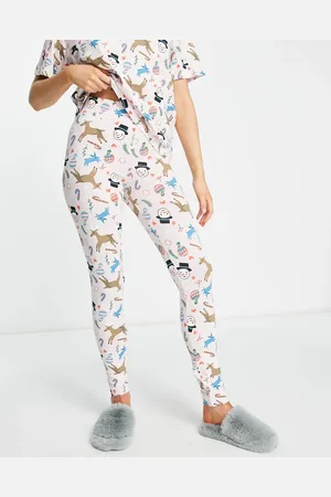 Monki Co-ord Christmas pyjama bottoms in pink all over print