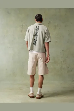 ASOS Boxy short sleeve polo with embroidery in