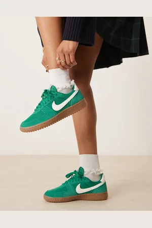 Nike Field General trainers in green and