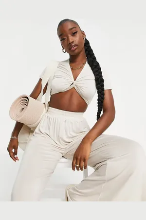 South Beach Yoga knot front short sleeve crop top in off