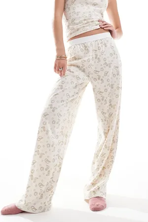 ASOS Mix & match pyjama trouser with exposed waistband in rodeo print