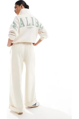 Hollister Zip through hoodie in with back print